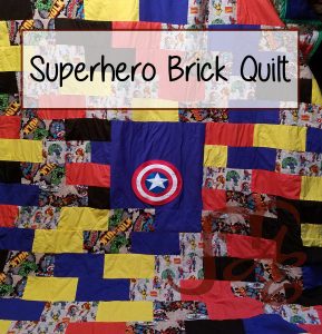 Quilt with superhero fabric in a brick pattern