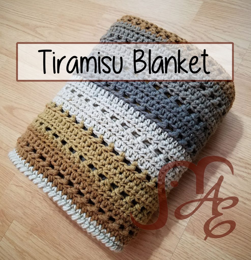 Folded crochet Tiramisu blanket in brown and grey tones